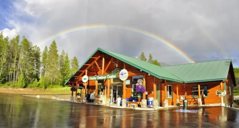 Visitor center with green roof and rainbow above