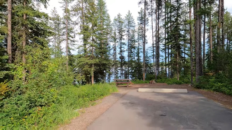 Picnic table and campsite at Lost Johnny Point Campground