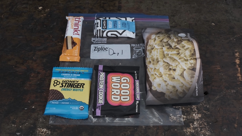 A simple backpacking meal kit laid out for a large group trip